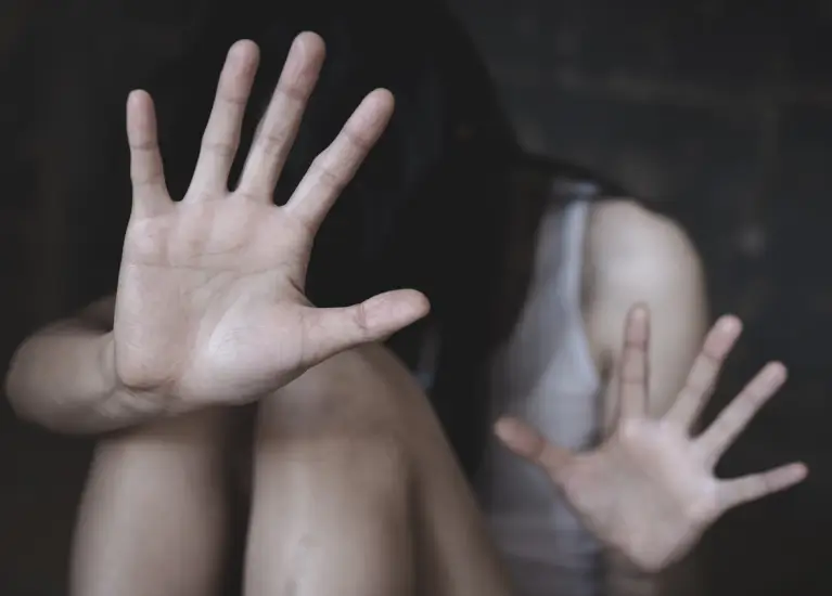 A person holding their hand up